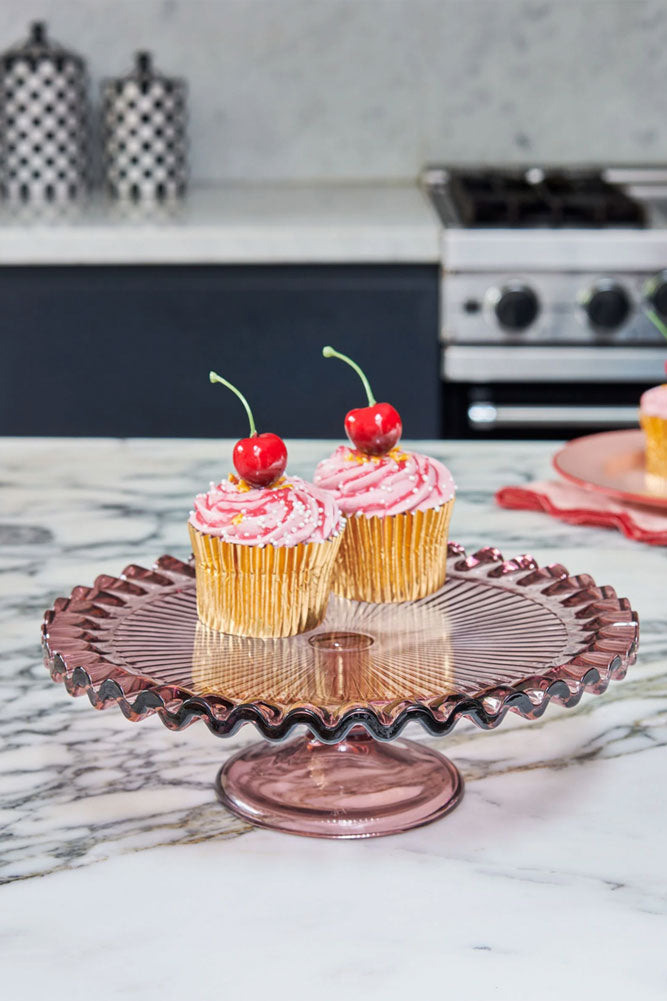 Joli présentoir à gâteaux en verre rose