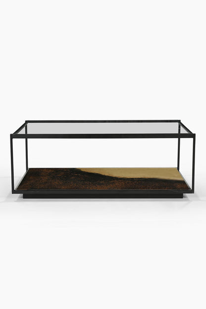 Belle table basse en métal bruni et verre