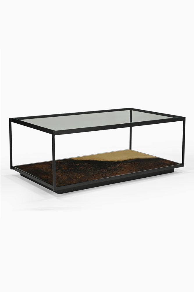 Belle table basse en métal bruni et verre