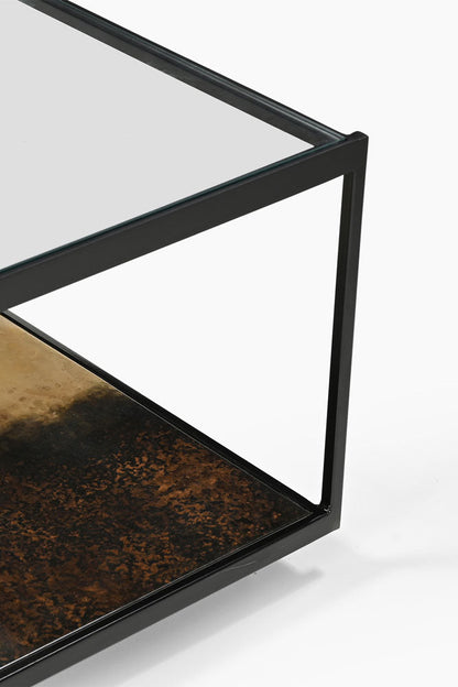 Belle table basse en métal bruni et verre