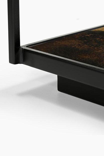 Belle table basse en métal bruni et verre