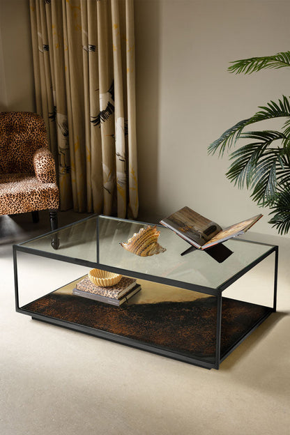 Belle table basse en métal bruni et verre