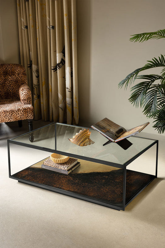 Belle table basse en métal bruni et verre