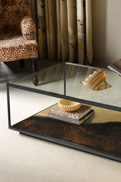 Belle table basse en métal bruni et verre