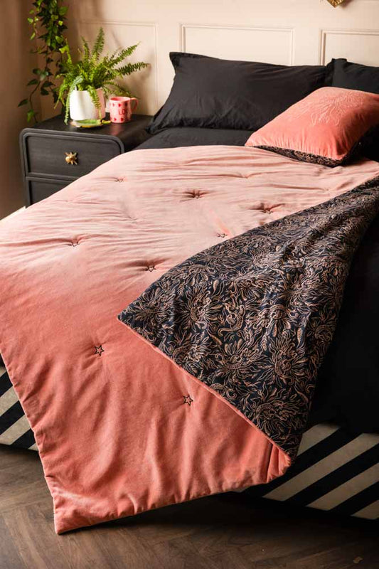 Couette réversible en velours noir et rose motif tigre