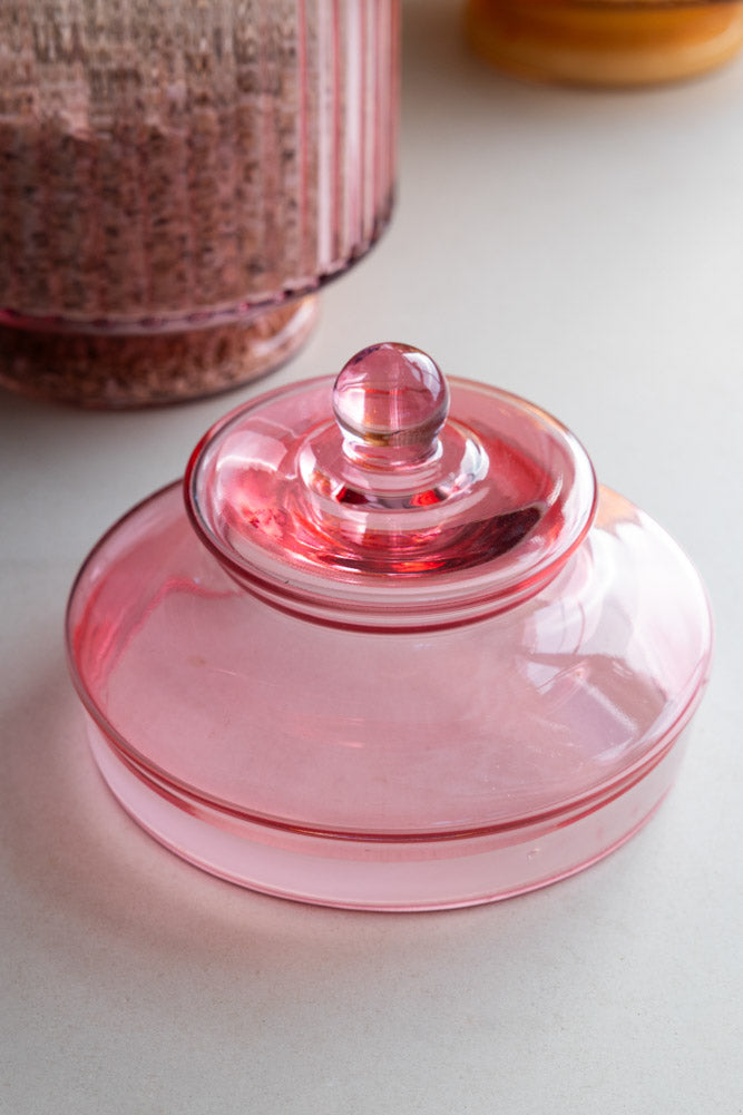 Élégant bocal de rangement en verre côtelé rose