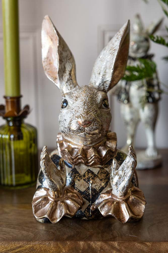 Fabuleux lapin applaudissant en or