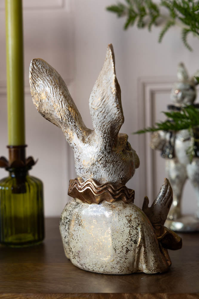 Fabuleux lapin applaudissant en or