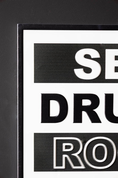 Sexe, Drogue, Rock 'n' Roll Sign