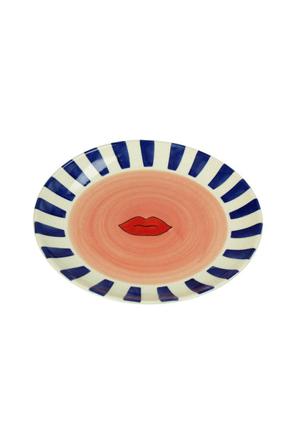 Assiette de service en céramique à bordure rayée et lèvres