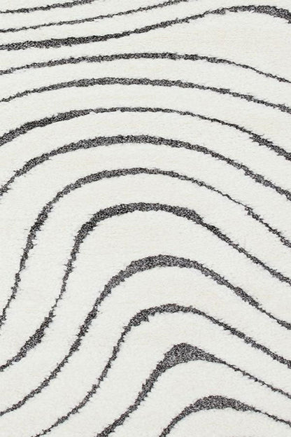 Le tapis Ariana en motif ondulé monochrome - Disponible en 3 tailles