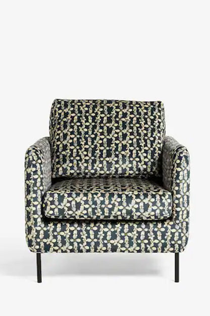 Le fauteuil en velours imprimé marguerites Edie