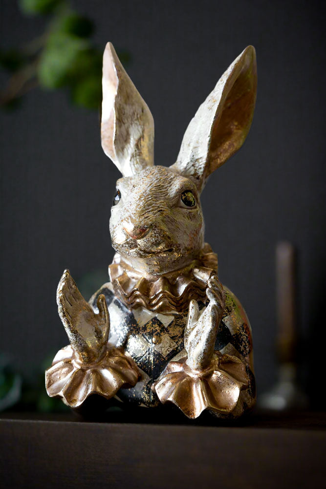 Fabuleux lapin applaudissant en or
