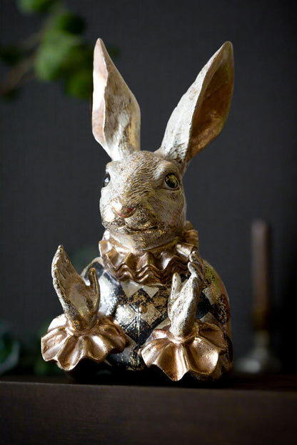 Fabuleux lapin applaudissant en or